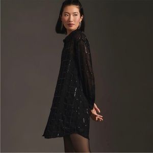 Black sequin t shirt dress.